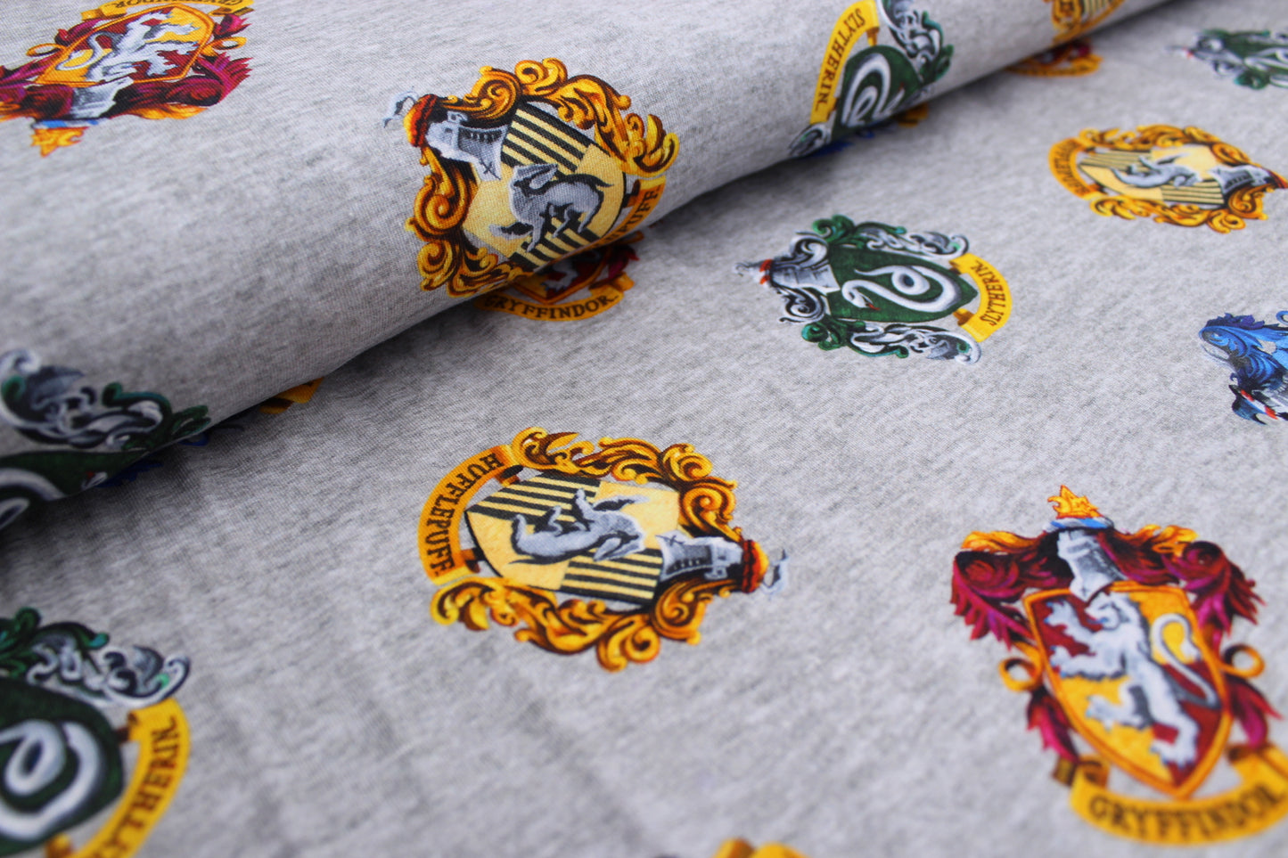 Baumwoll Jersey "Harry Potter" bunt hellgrau *Breite 151cm*