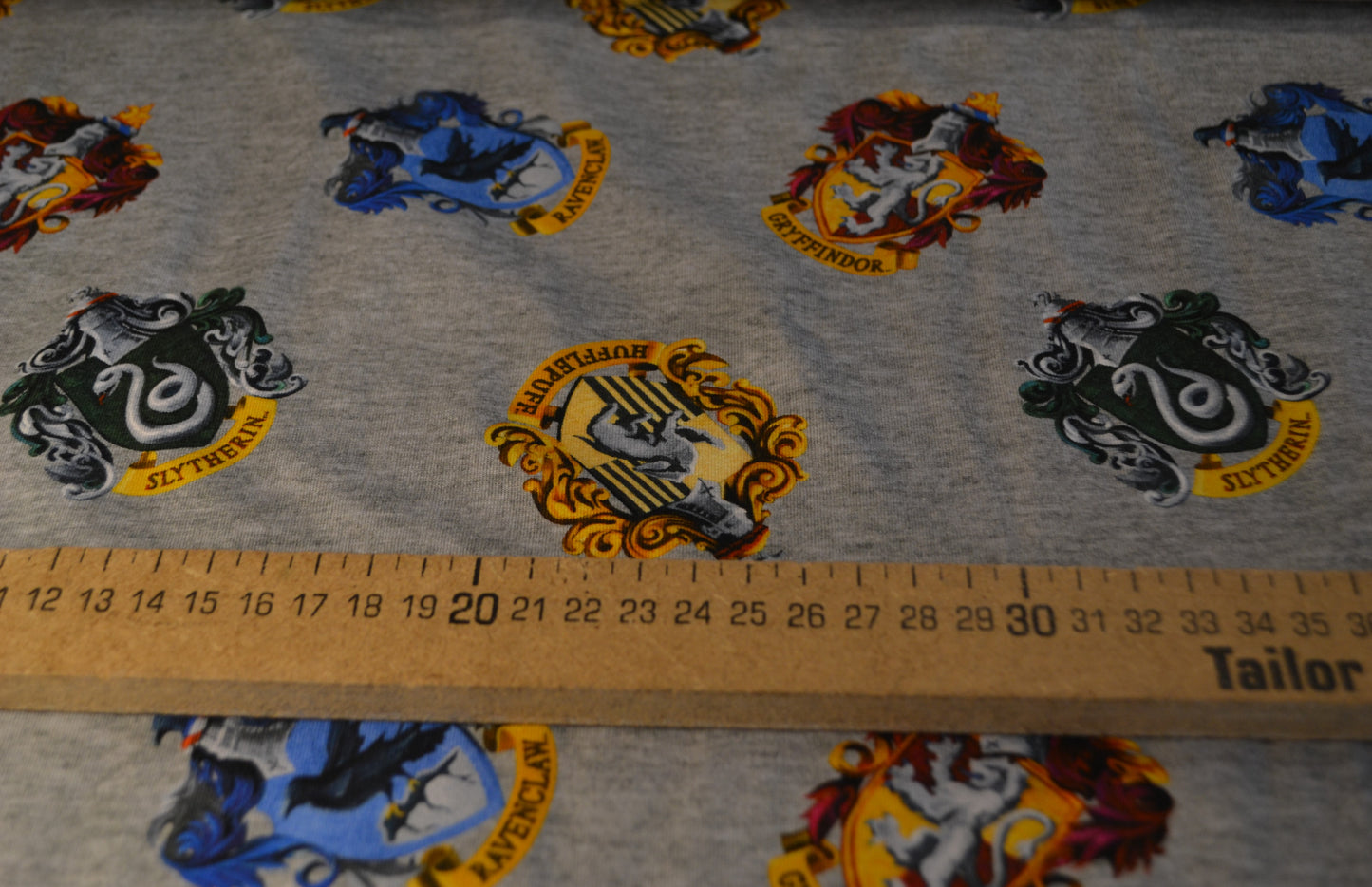 Baumwoll Jersey "Harry Potter" bunt hellgrau *Breite 151cm*