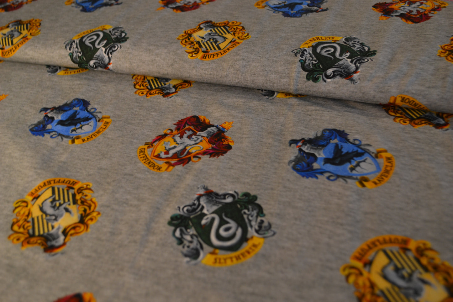 Baumwoll Jersey "Harry Potter" bunt hellgrau *Breite 151cm*
