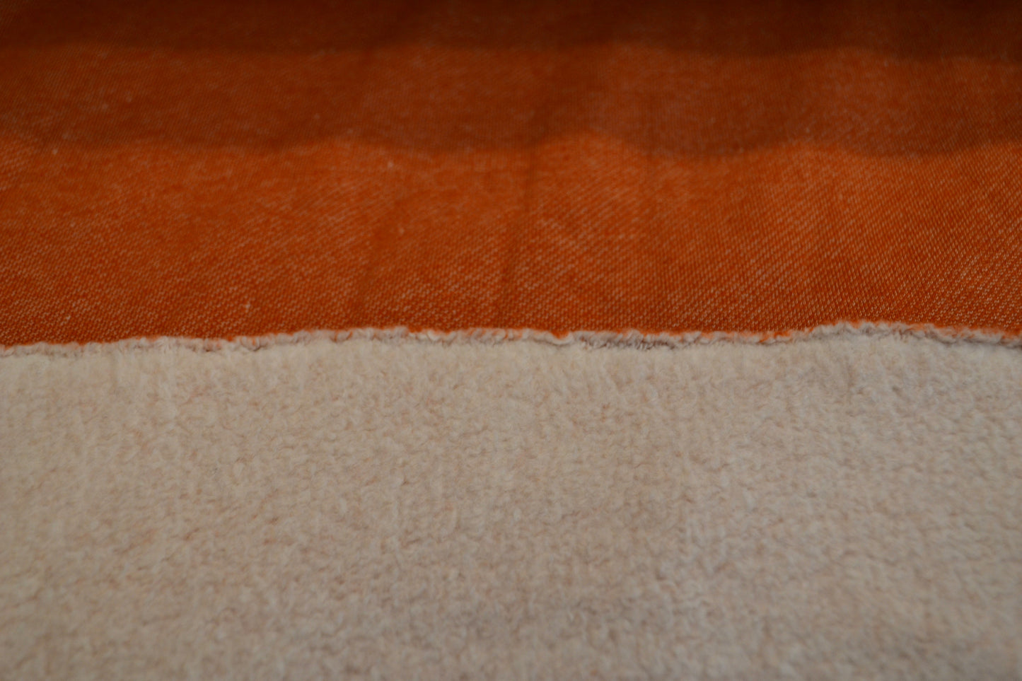 Fleece "Lammfelloptik"uni orange *Breite 130cm*