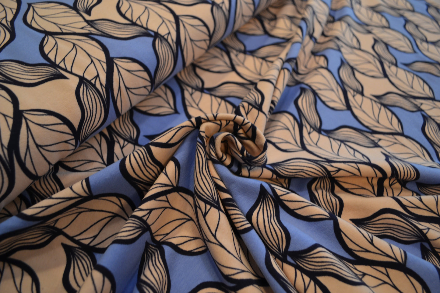 Baumwoll Jersey Blätter apricot blau *Breite 148cm*