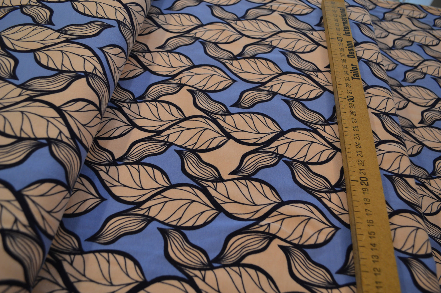 Baumwoll Jersey Blätter apricot blau *Breite 148cm*