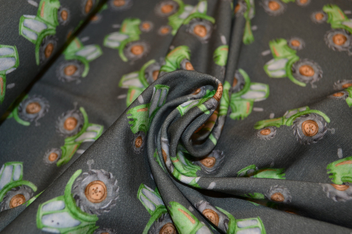 Baumwoll Jersey "Traktor" grün *Breite 151cm*