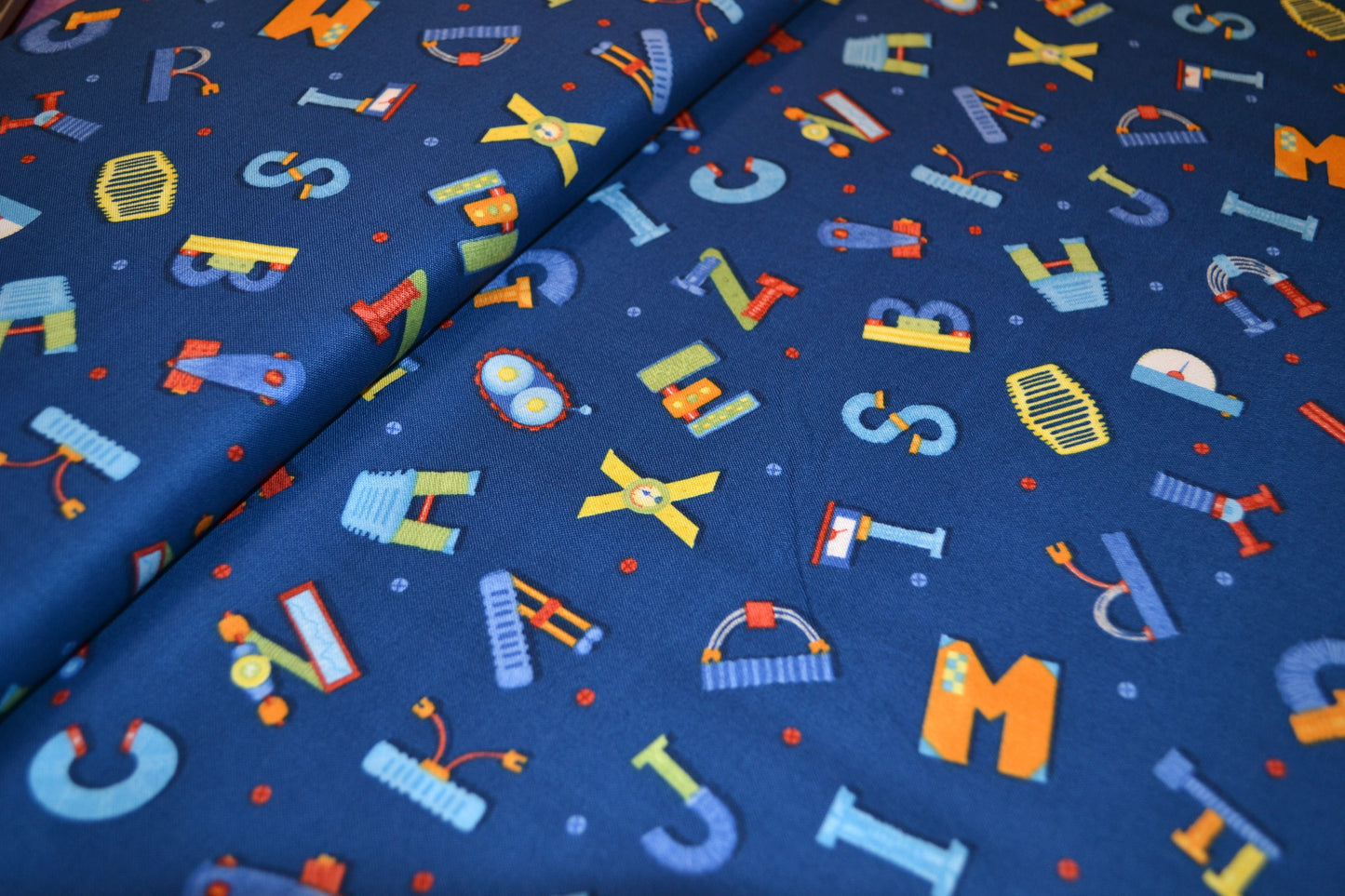 Patchwork Baumwolle "Buchstaben" bunt blau *Breite 110 cm*