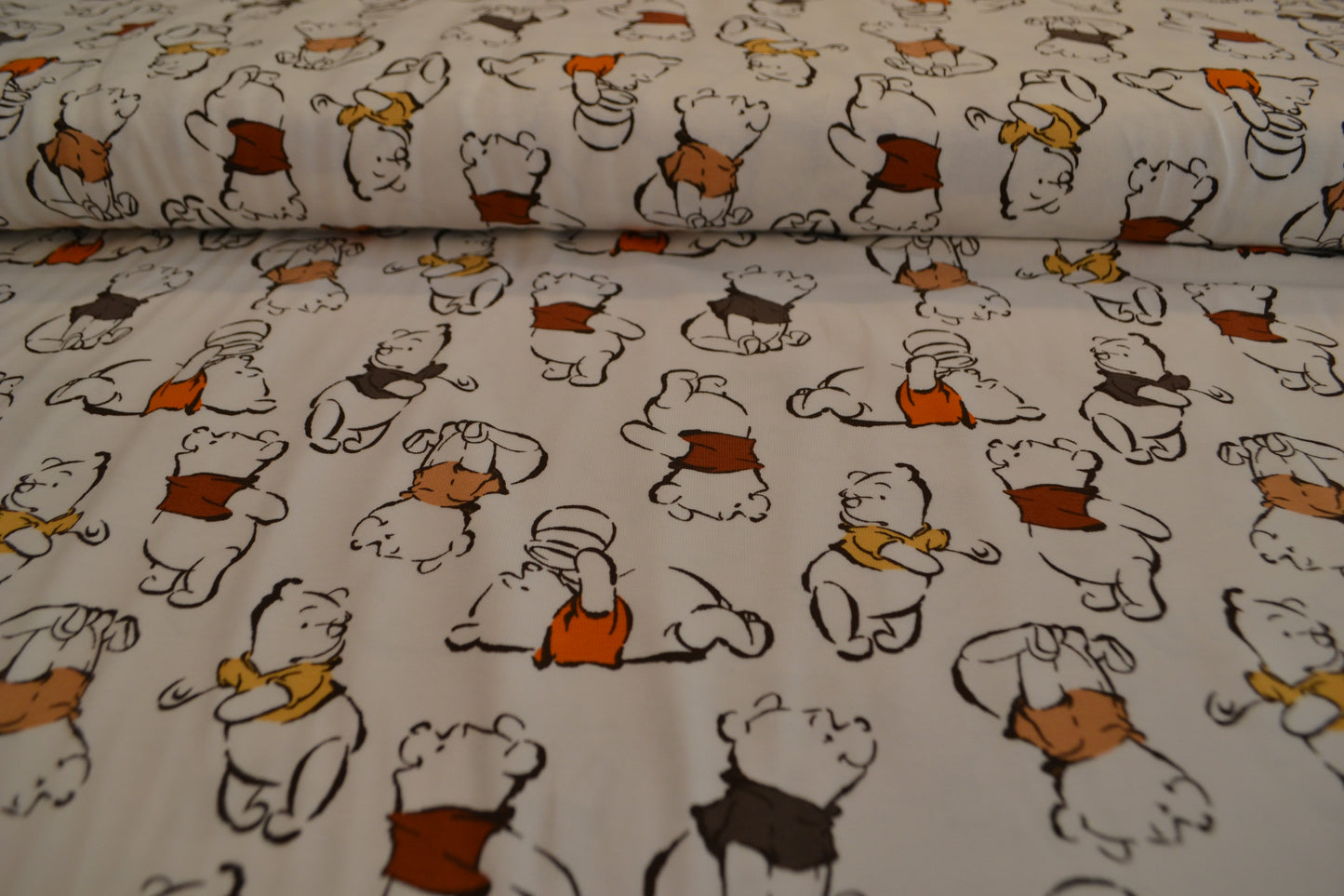 Baumwoll Jersey "Winnie Pooh" orange braun beige weiß *Breite 150cm*