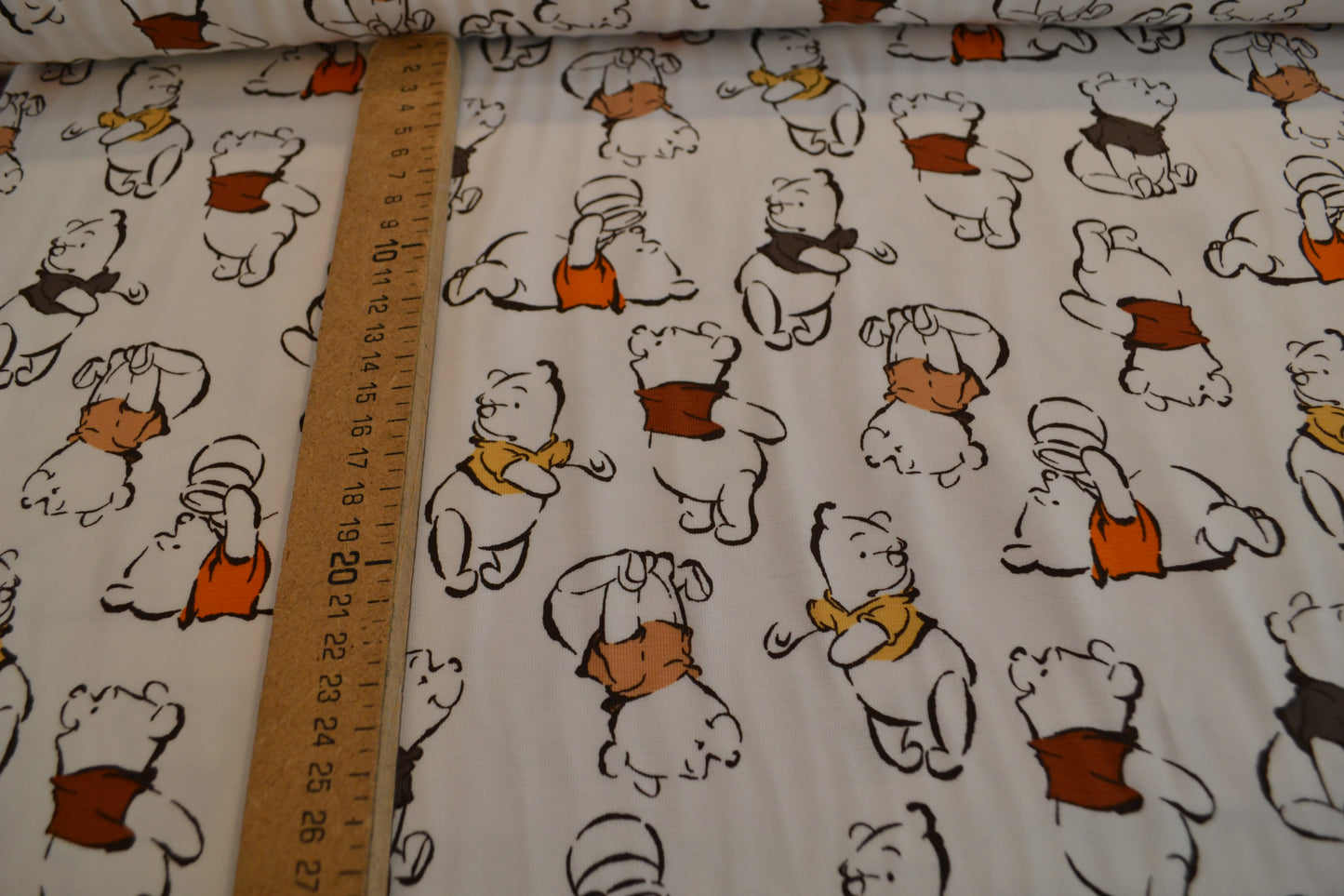 Baumwoll Jersey "Winnie Pooh" orange braun beige weiß *Breite 150cm*