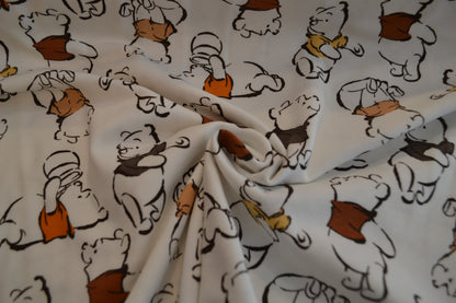 Baumwoll Jersey "Winnie Pooh" orange braun beige weiß *Breite 150cm*