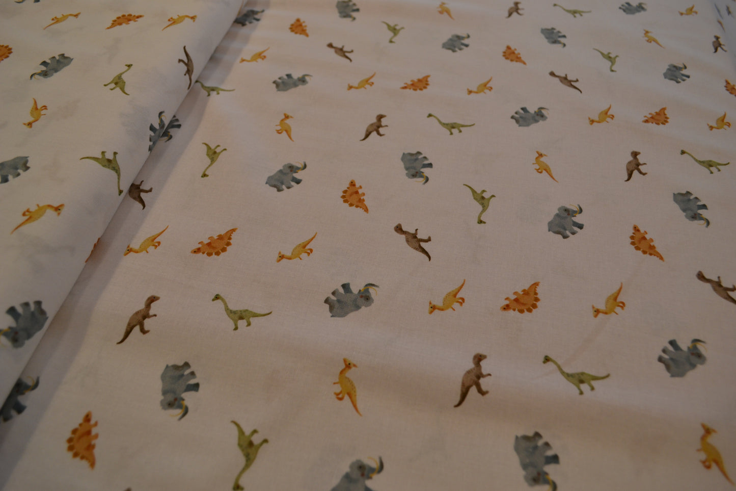 Baumwolle "Dinos" blau grün braun weiß *Breite 142 cm*