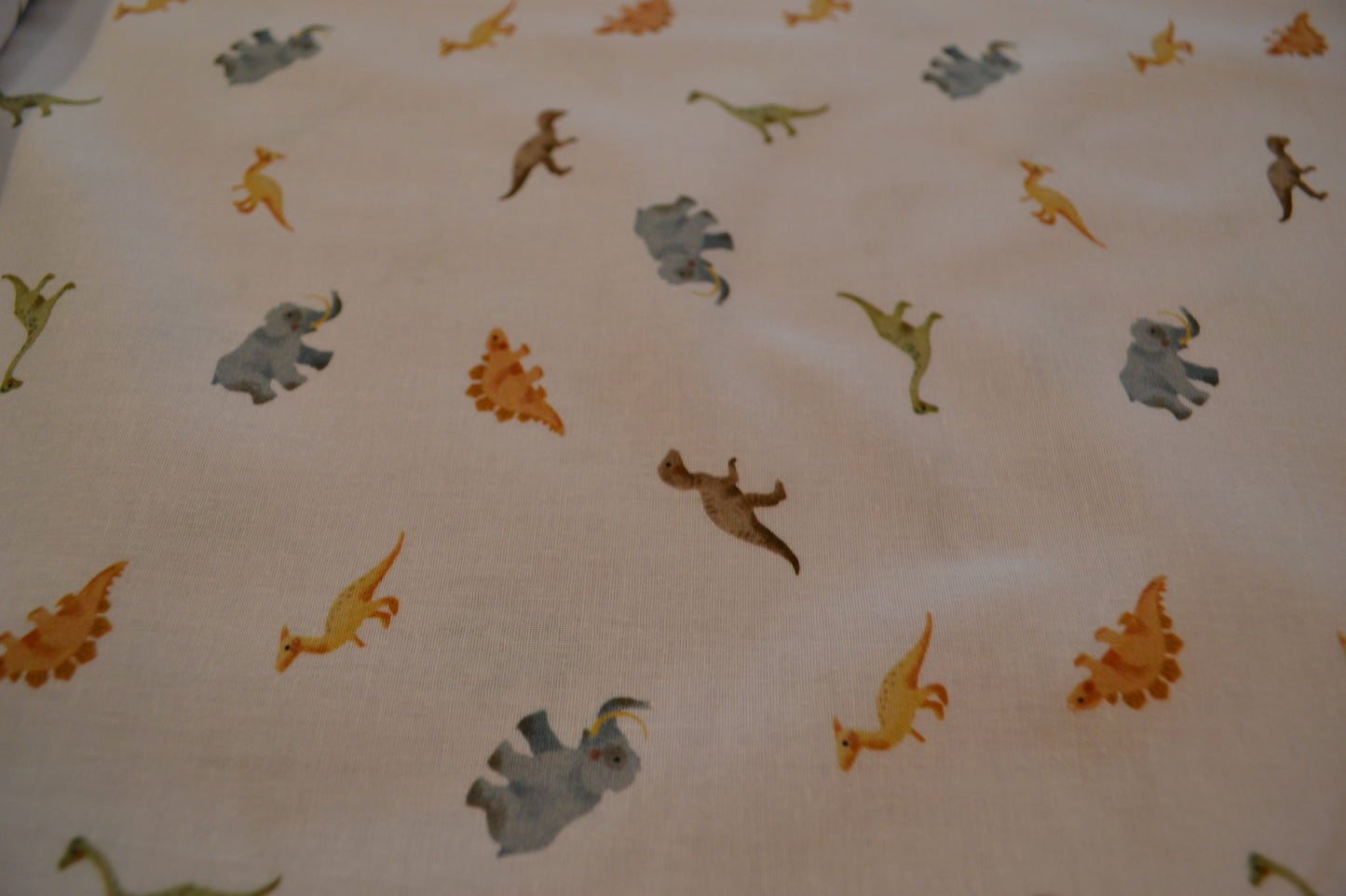 Baumwolle "Dinos" blau grün braun weiß *Breite 142 cm*