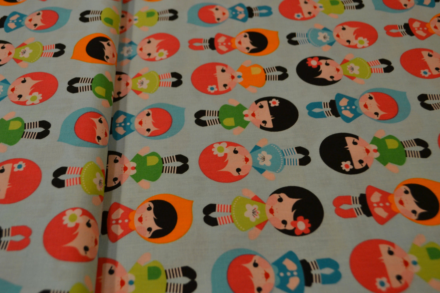 Patchwork Baumwolle "Puppen" bunt hellblau *Breite 110 cm*