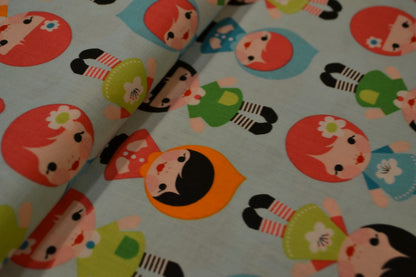 Patchwork Baumwolle "Puppen" bunt hellblau *Breite 110 cm*